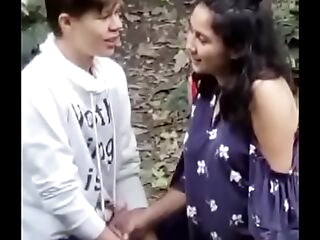 Indian doll outdoor with foreign guy